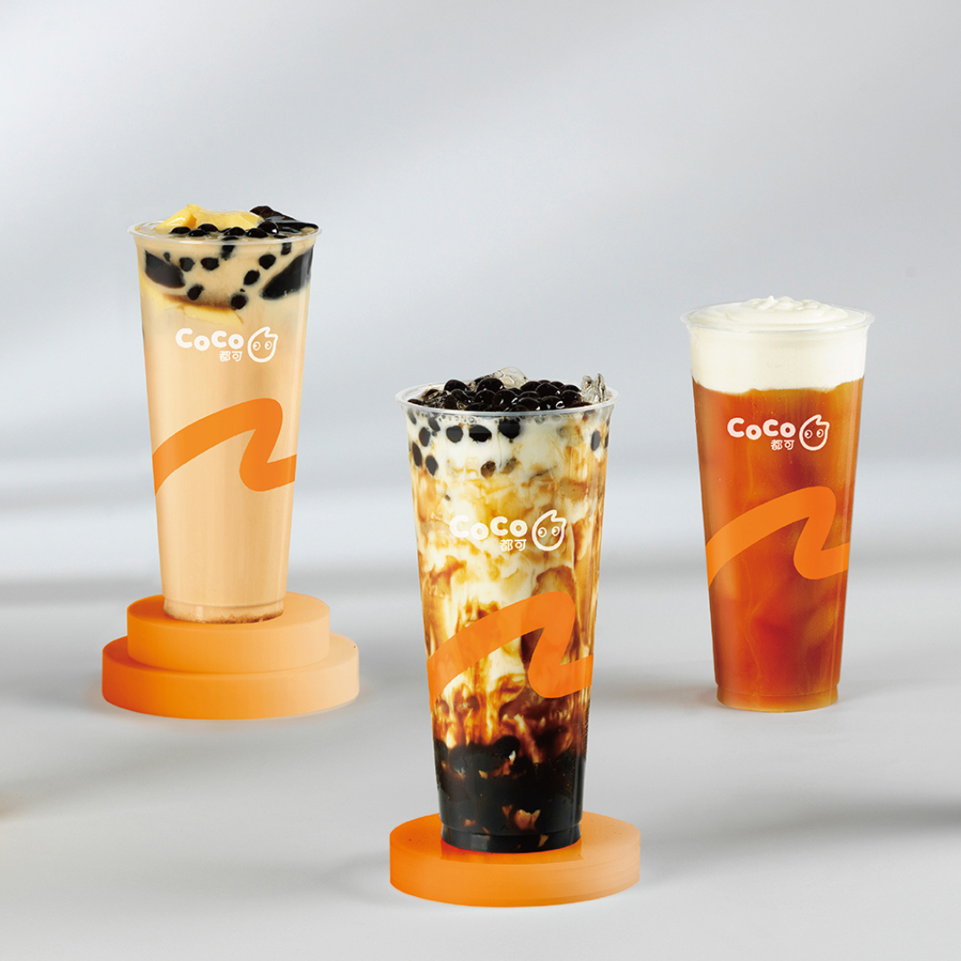 Three cups of CoCo Bubble Tea drinks showing the ease of launching a bubble tea franchise shop.