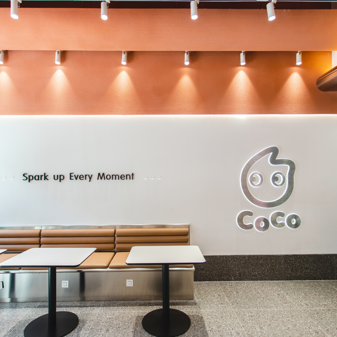 A birght, brand new CoCo boba tea shop.